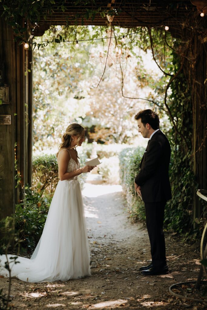 Intimate garden ceremony at McGill Rose Garden Charlotte NC photographed by Bekah Cabrejos Photography