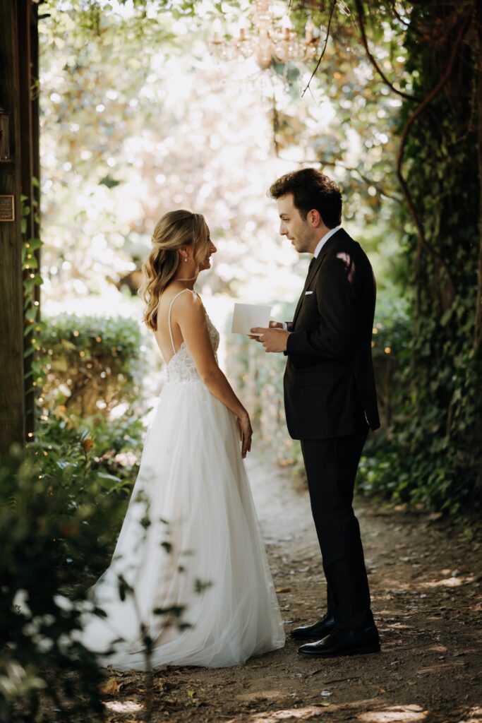 Intimate garden ceremony at McGill Rose Garden Charlotte NC photographed by Bekah Cabrejos Photography
