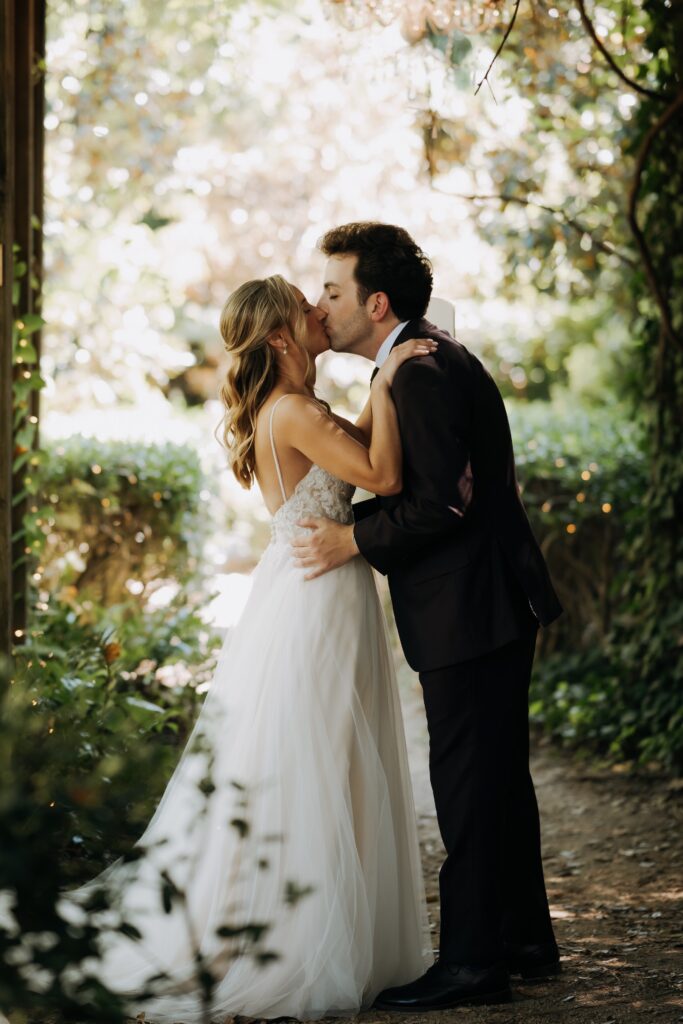 Intimate garden ceremony at McGill Rose Garden Charlotte NC photographed by Bekah Cabrejos Photography