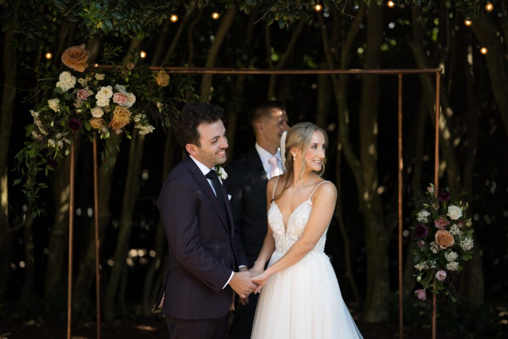 Intimate garden ceremony at McGill Rose Garden Charlotte NC photographed by Bekah Cabrejos Photography