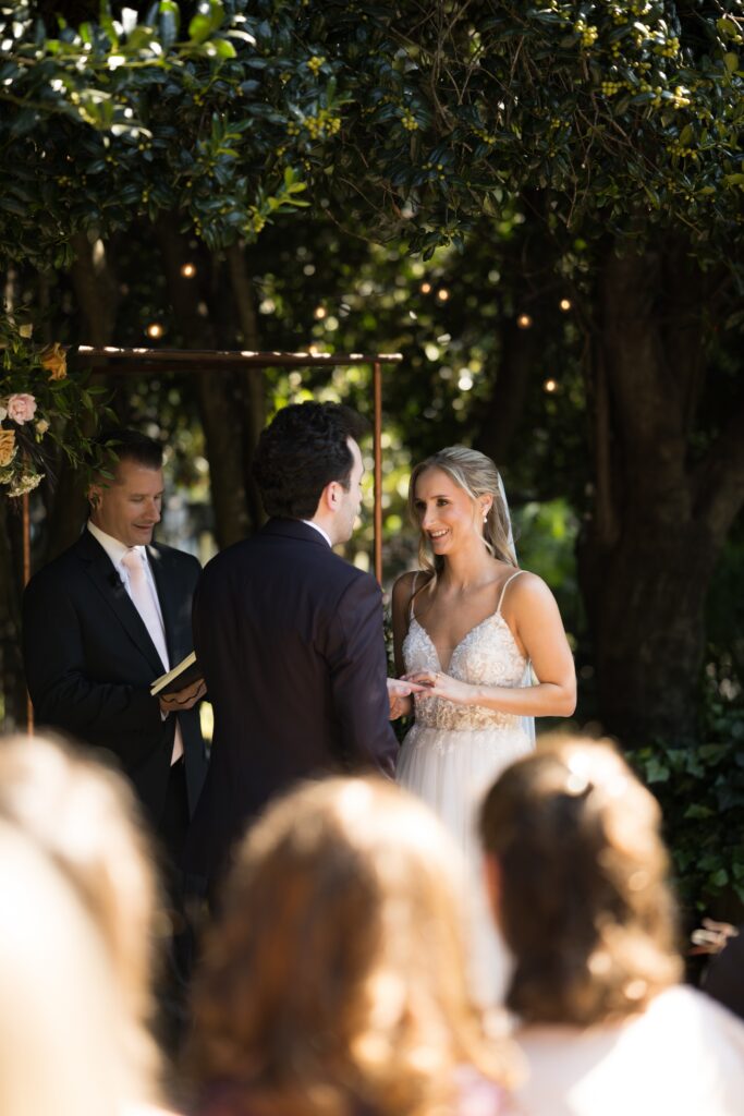 Intimate garden ceremony at McGill Rose Garden Charlotte NC photographed by Bekah Cabrejos Photography