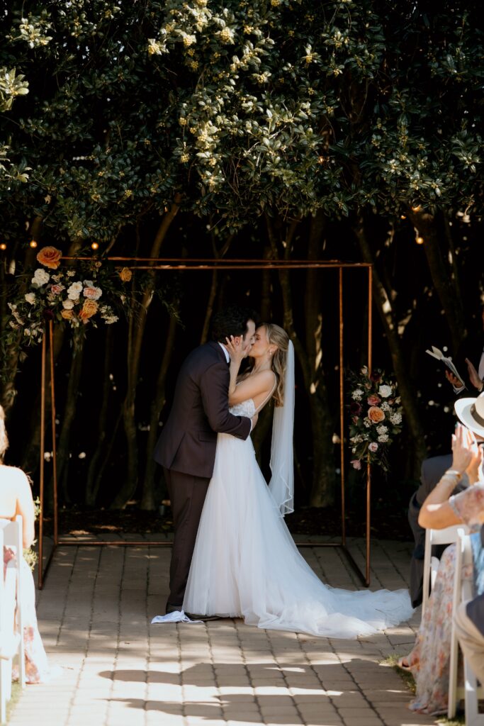 Intimate garden ceremony at McGill Rose Garden Charlotte NC photographed by Bekah Cabrejos Photography