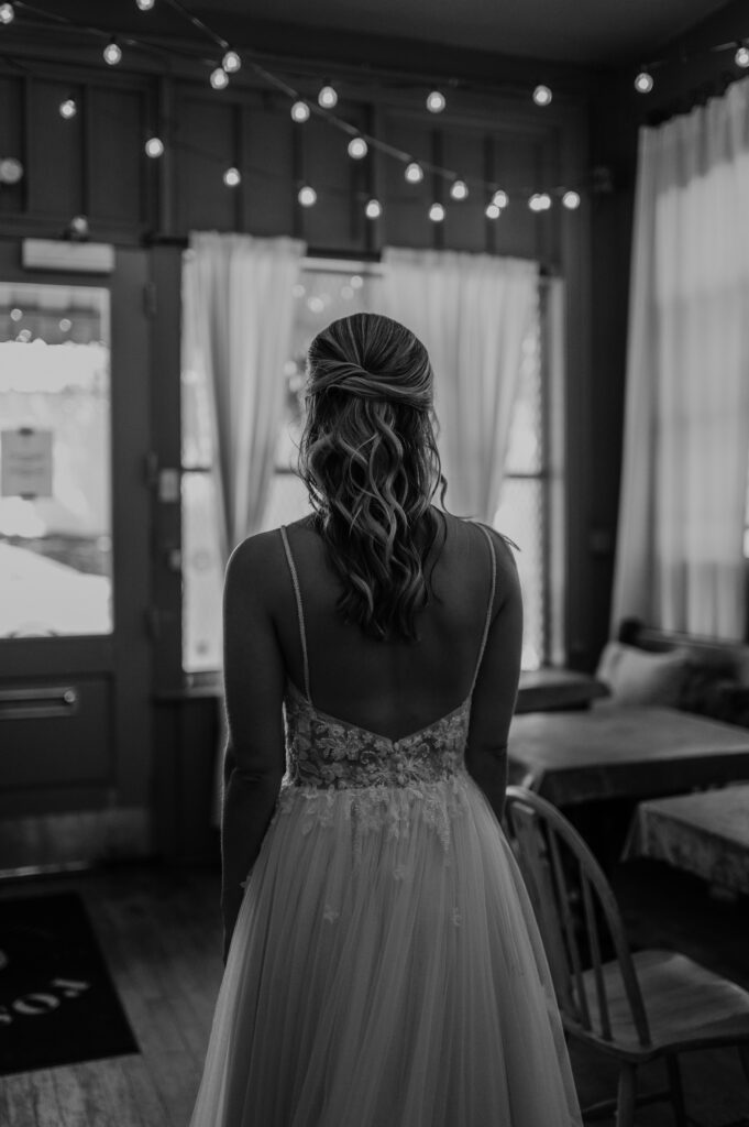 Bride and groom in garden at McGill Rose Garden wedding in Charlotte NC photographed by Charlotte NC wedding photographer Bekah Cabrejos