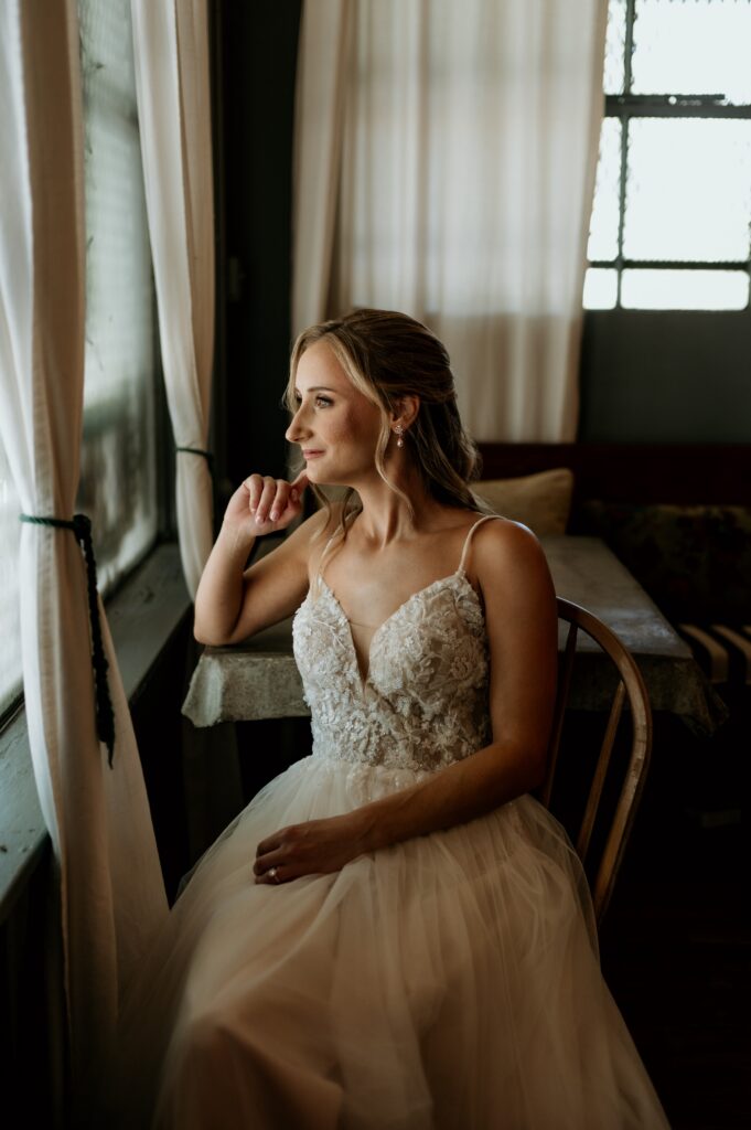 Bride and groom in garden at McGill Rose Garden wedding in Charlotte NC photographed by Charlotte NC wedding photographer Bekah Cabrejos