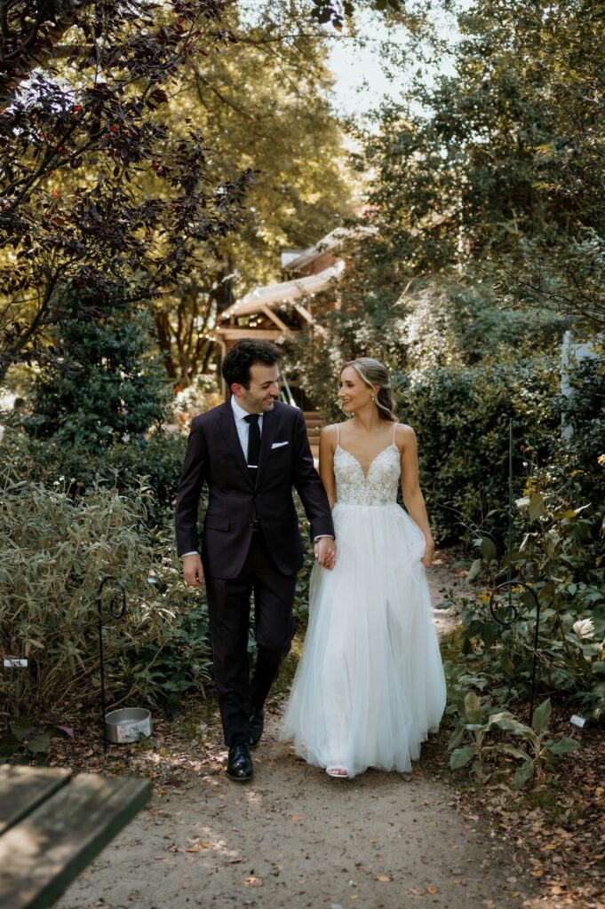 Intimate garden newlywed photos at McGill Rose Garden Charlotte NC photographed by Bekah Cabrejos Photography