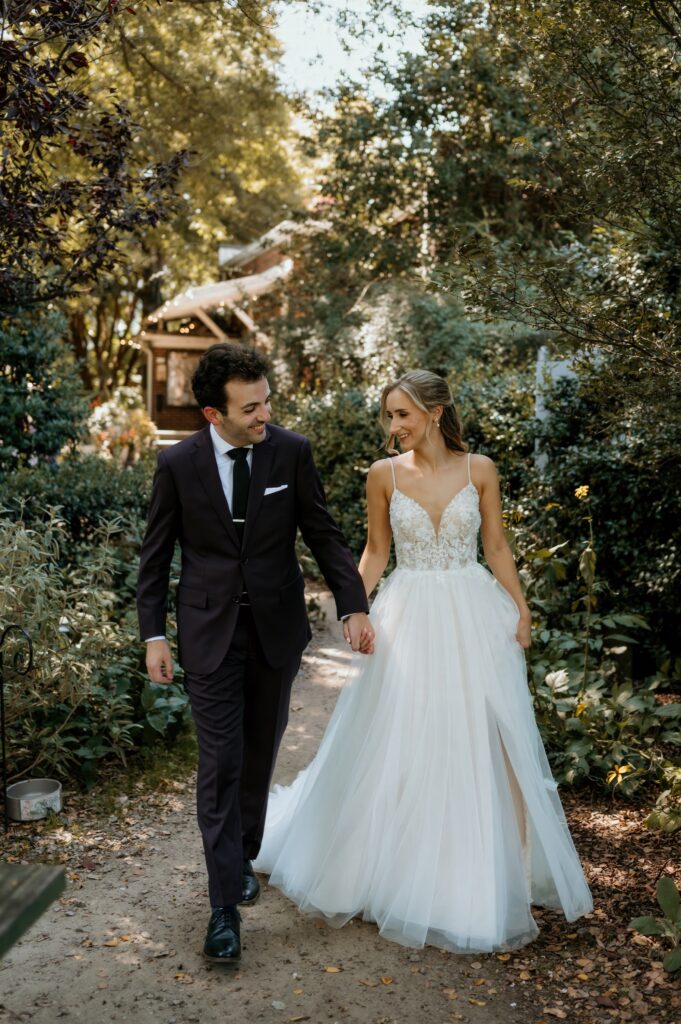 Intimate garden newlywed photos at McGill Rose Garden Charlotte NC photographed by Bekah Cabrejos Photography