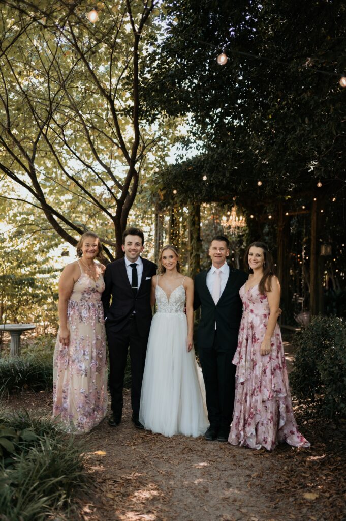 Intimate garden ceremony at McGill Rose Garden Charlotte NC photographed by Bekah Cabrejos Photography
