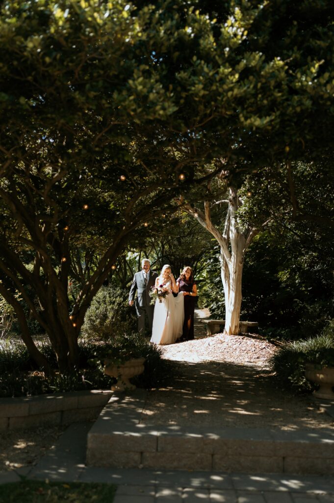 Intimate garden ceremony at McGill Rose Garden Charlotte NC photographed by Bekah Cabrejos Photography