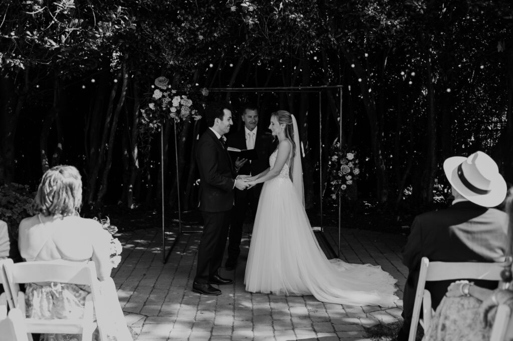 Intimate garden ceremony at McGill Rose Garden Charlotte NC photographed by Bekah Cabrejos Photography