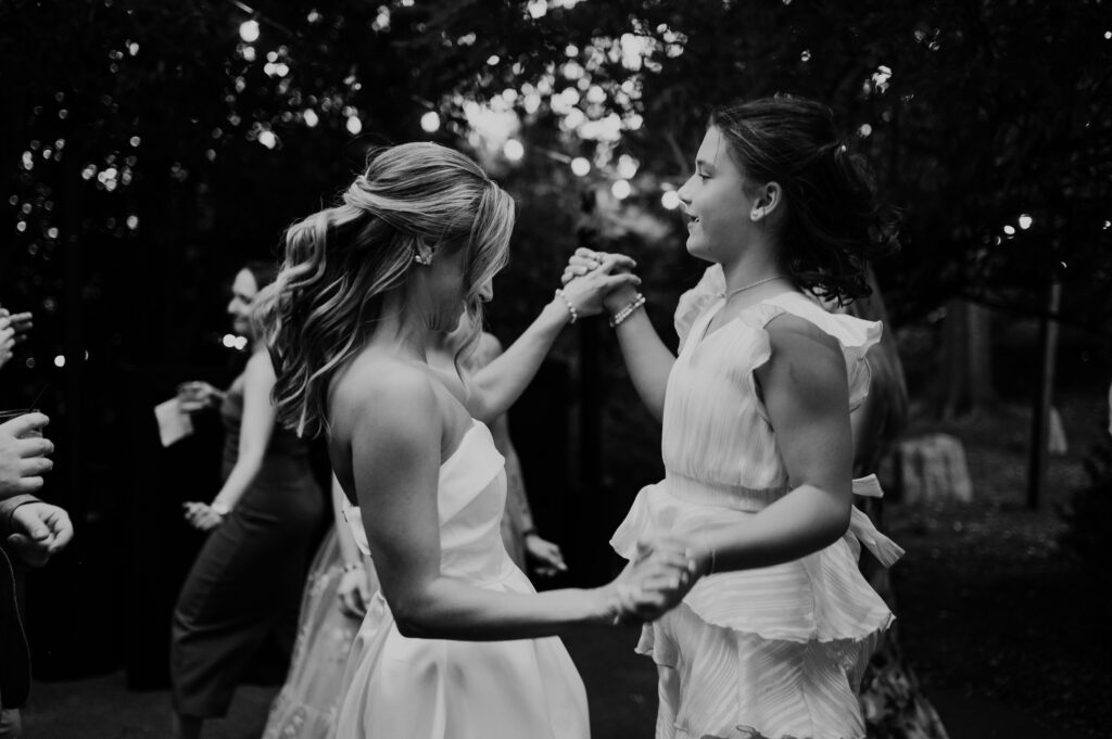 Intimate garden reception and hora at McGill Rose Garden Charlotte NC photographed by Bekah Cabrejos Photography