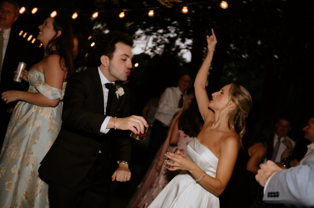 Intimate garden reception and hora at McGill Rose Garden Charlotte NC photographed by Bekah Cabrejos Photography