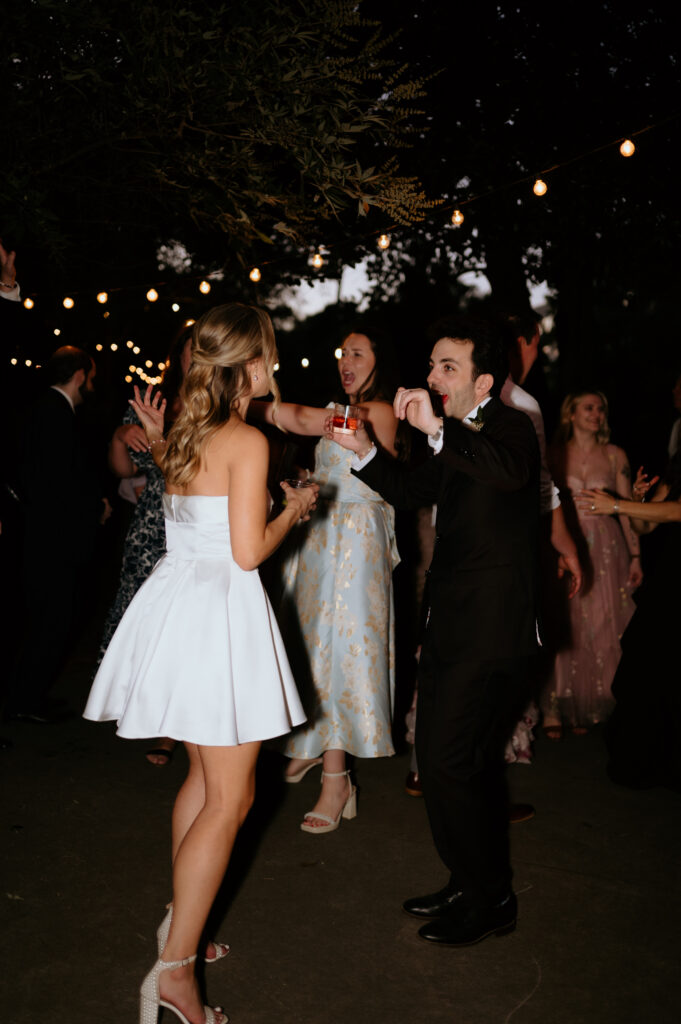 Intimate garden reception and hora at McGill Rose Garden Charlotte NC photographed by Bekah Cabrejos Photography