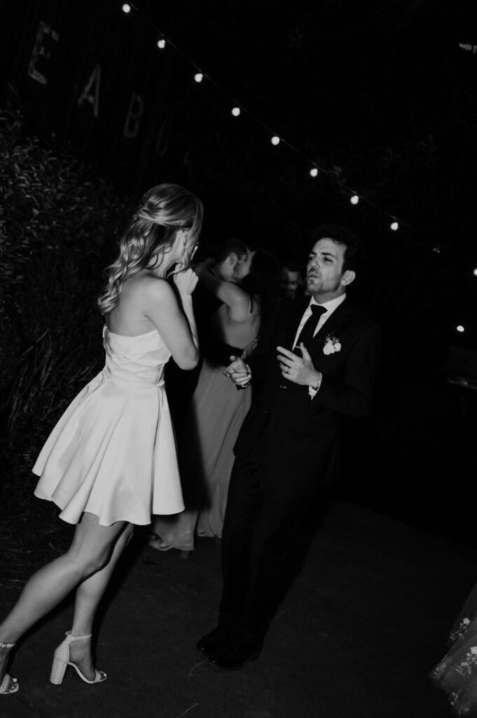 Intimate garden reception and hora at McGill Rose Garden Charlotte NC photographed by Bekah Cabrejos Photography