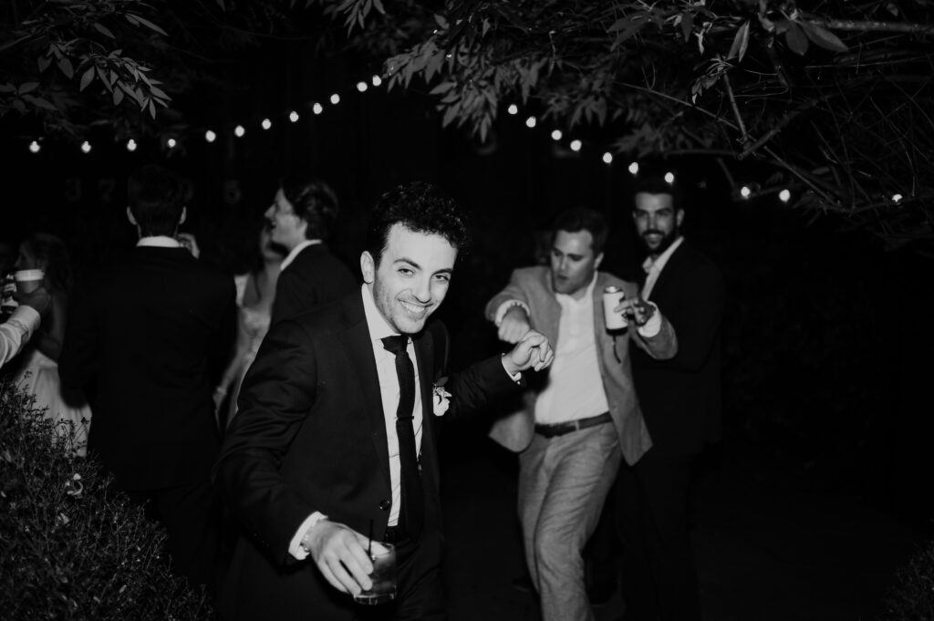 Intimate garden reception and hora at McGill Rose Garden Charlotte NC photographed by Bekah Cabrejos Photography