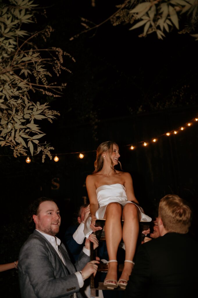 Intimate garden reception and hora at McGill Rose Garden Charlotte NC photographed by Bekah Cabrejos Photography