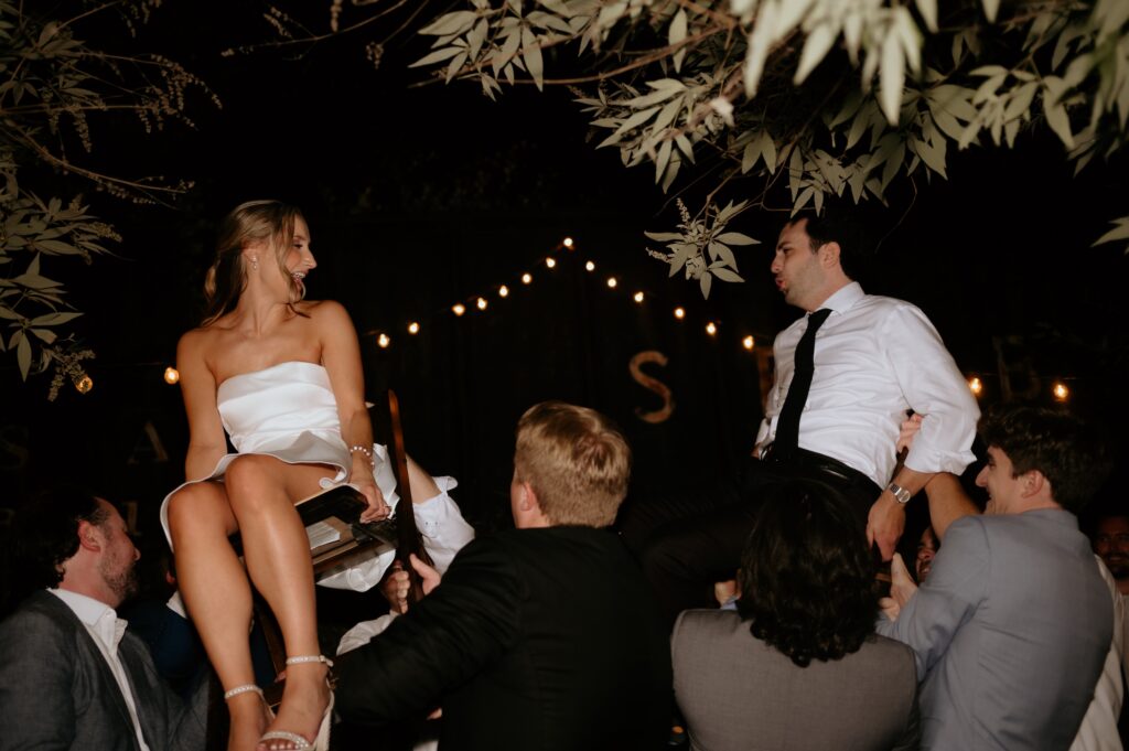 Intimate garden reception and hora at McGill Rose Garden Charlotte NC photographed by Bekah Cabrejos Photography